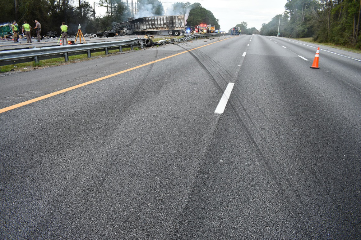 Northbound view of the crash scene, including tire marks from the leftward arc of the Eagle Express truck.